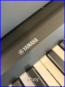 Pre-loved Yamaha P-145 digital piano with foot pedal, stand, books and soft case