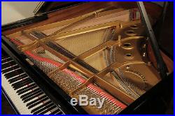 Rebuilt, 1970 Steinway Model A grand piano with a black case and spade legs