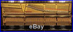 Reconditioned, 1939, Steinway Model K upright piano with a black case
