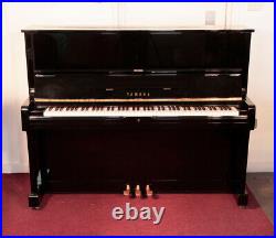 Reconditioned, 1974, Yamaha U1 Upright Piano with a Black Case. 3 year warranty