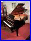 Reconditioned-2000-Yamaha-C6-grand-piano-with-a-black-case-and-spade-legs-01-dp