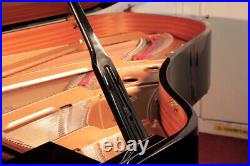 Reconditioned, 2000, Yamaha C6 grand piano with a black case and spade legs