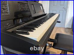 Roland FP10 Digital Piano with stand, seat and case