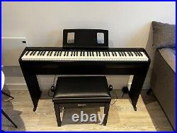 Roland FP10 digital piano with Roland stand, Roland stool and Gator carry case