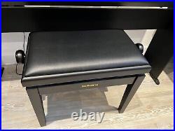 Roland FP10 digital piano with Roland stand, Roland stool and Gator carry case
