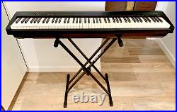 Roland FP30 Digital Piano, with dust cover, stand, and carry case