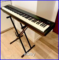 Roland FP30 Digital Piano, with dust cover, stand, and carry case