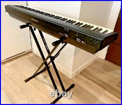 Roland FP30 Digital Piano, with dust cover, stand, and carry case