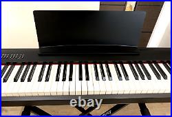 Roland FP30 Digital Piano, with dust cover, stand, and carry case