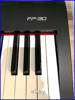 Roland FP30 Digital Piano, with dust cover, stand, and carry case