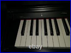 Roland LX-7 Digital Piano. Black wooden case. Fully adjustable Stool