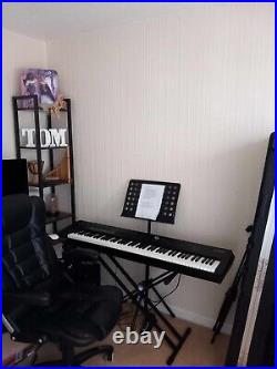 Roland RD 2000 Stage Piano With Case, Amp, Pedal, Music and Keyboard Stand