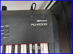 Roland RD 2000 Stage Piano With Case, Amp, Pedal, Music and Keyboard Stand