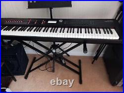 Roland RD 2000 Stage Piano With Case, Amp, Pedal, Music and Keyboard Stand