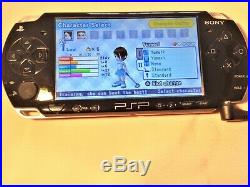 SONY PSP-2003 Slim and Lite Piano Black Handheld System +original charger + case
