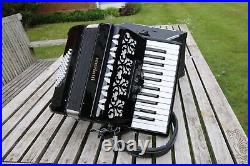 Scarlatti Piano accordion 48 bass 3 voice Black. With harness and hard case