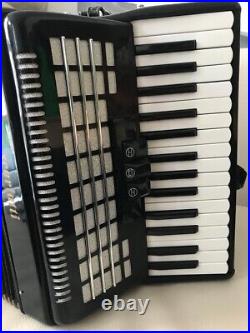 Scarlatti Piano accordion Black. With harness and hard case, GOOD USED CONDITION