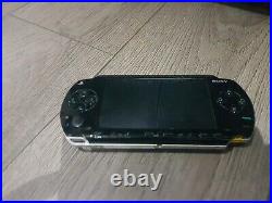 Sony PSP-1001 Piano Black +6 Games + Dock/case