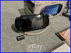 Sony PSP 1003 Piano Black Bundle 14 games, 2 movies, hard & soft case
