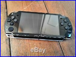 Sony PSP 2000 PlayStation Portable System Piano Black plus case and 6 games