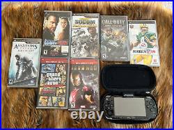 Sony PSP 2001 Black - Case, 7 Games And 4 GB Card included