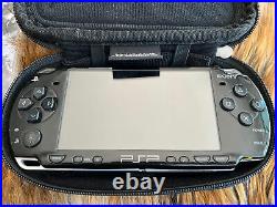 Sony PSP 2001 Black - Case, 7 Games With Booklets And 4 GB Card included