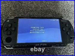 Sony PSP 2003 Console Piano Black & 2GB + 512MB SD Cards + Case + 5 Games + UMD