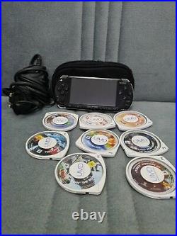 Sony PSP 2003 PlayStation Portable System Black with games, carry case& 2gb