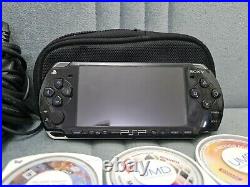 Sony PSP 2003 PlayStation Portable System Black with games, carry case& 2gb
