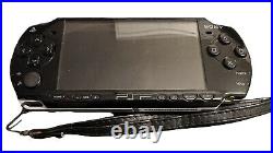 Sony PSP 2003 PlayStation Portable System New Battery Case 8 Games 5 Movies