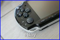 Sony PSP 2003 Slim Piano Black With 7 Games (Grand Theft Auto) & Case