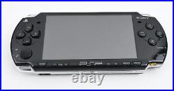 Sony PSP 2003 /Slim and Lite Piano Black (in blue Chelsea casing), Boxed