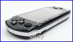 Sony PSP 2003 /Slim and Lite Piano Black (in blue Chelsea casing), Boxed