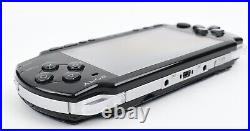 Sony PSP 2003 /Slim and Lite Piano Black (in blue Chelsea casing), Boxed