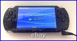 Sony PSP 2003 /Slim and Lite Piano Black (in blue Chelsea casing), Boxed