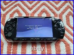 Sony PSP 2003 slim, 32gb, 36 games installed, case and charger, CFW