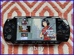 Sony PSP 2003 slim, 32gb, 36 games installed, case and charger, CFW
