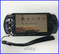 Sony PSP-3000 64MB Piano Black Handheld System with 4 Games GTA Case and Charger