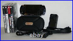 Sony PSP-3000 64MB Piano Black System Bundle with Charger, Case & 4 Games GTA