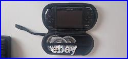 Sony PSP 3000 Black With 9 Games, 1 UMD Video, Case, And Charger
