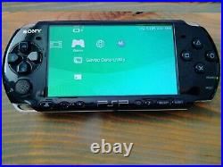 Sony PSP-3000 Handheld Console (Piano Black) with carrying case & Charger