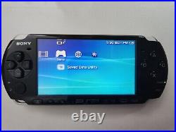 Sony PSP-3000 Piano Black Handheld System with case + Headphone