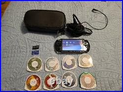 Sony PSP-3000 Softmoded + 7 UMD games + Two Memory Cards + Charger and Case