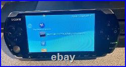 Sony PSP 3001 Handheld System With Charger, 32GB Card and Case
