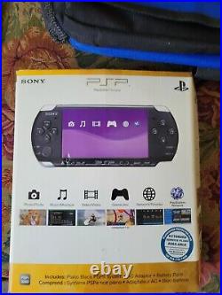 Sony PSP-3001 With 16 games With8 movies, carrying cases and bag