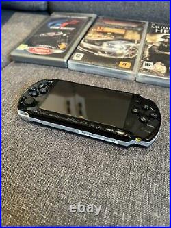 Sony PSP-3003 Black Console. Includes Case, Games & Charger