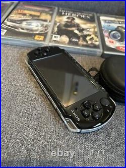 Sony PSP-3003 Black Console. Includes Case, Games & Charger