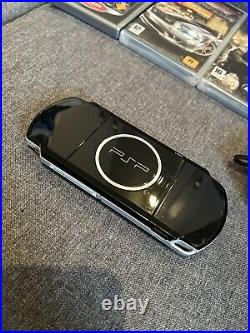 Sony PSP-3003 Black Console. Includes Case, Games & Charger