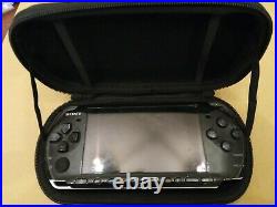 Sony PSP 3003 PSP 3 Piano Black + Case + Harry Potter & Pirates Game