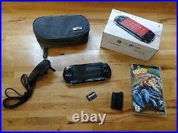 Sony PSP 3003 (piano black) boxed Inc Crash of the Titans and Case